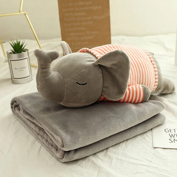 Peluche éléphant endormi en pyjama