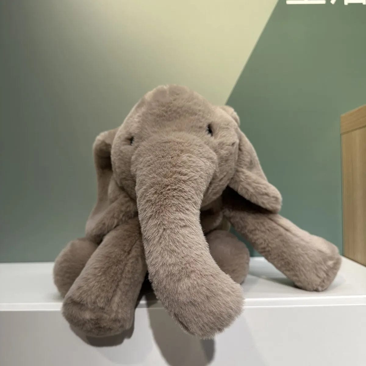 Peluche éléphant gris tout doux