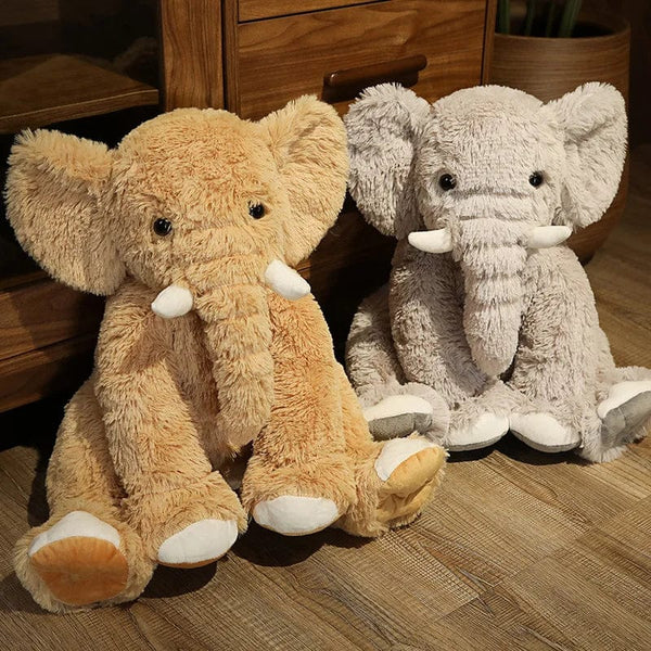 Peluche éléphant poilu aux petites défenses