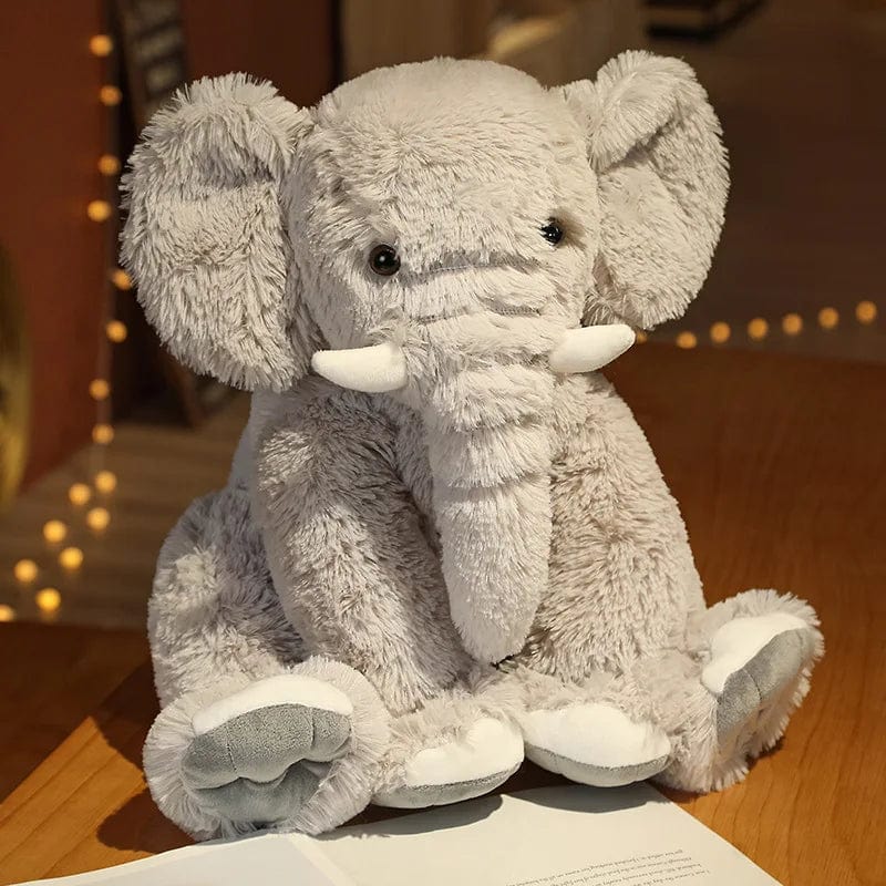 Peluche éléphant poilu aux petites défenses Gris