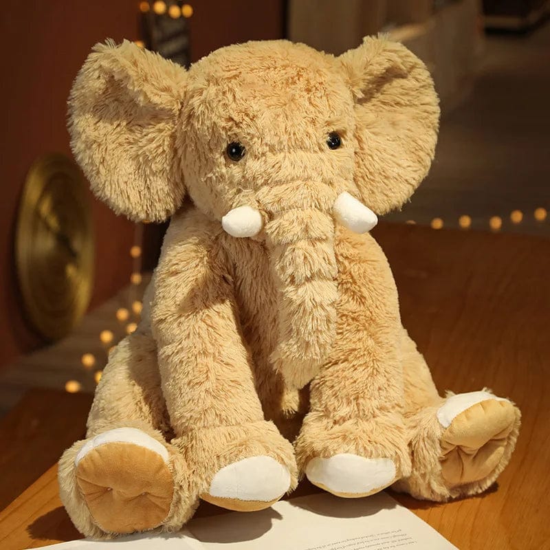 Peluche éléphant poilu aux petites défenses Marron