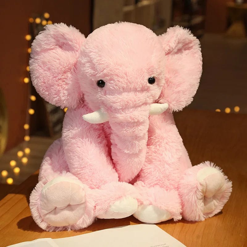 Peluche éléphant poilu aux petites défenses Rose