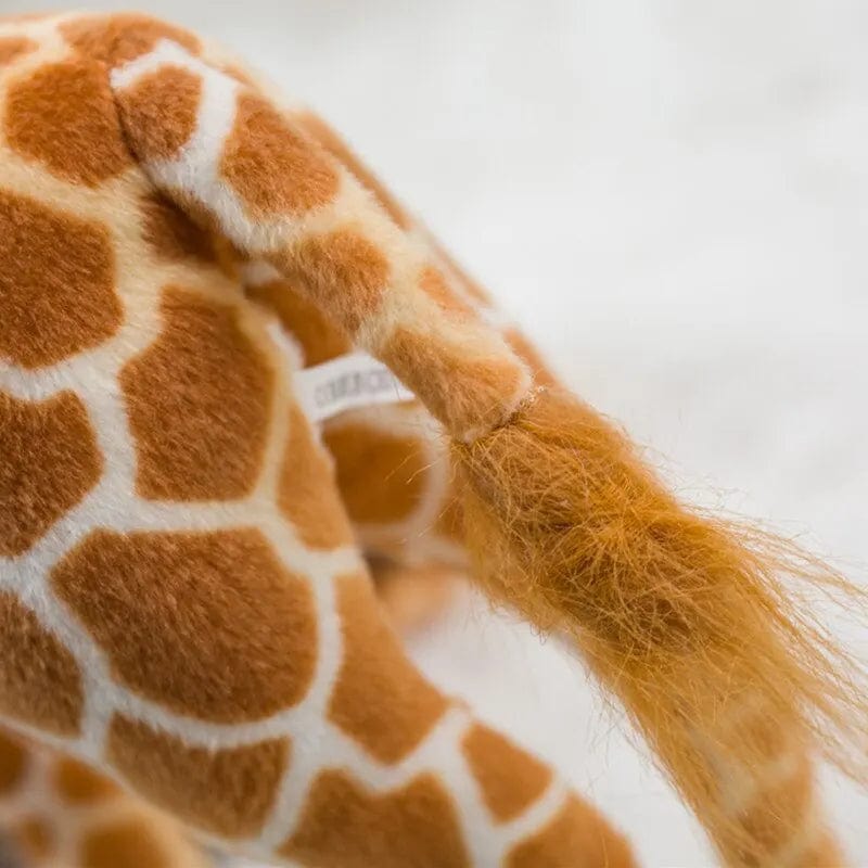 Peluche girafe douce et joyeuse