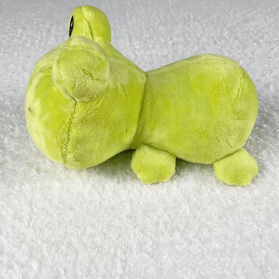Peluche grenouille verte douce enfant câline et ludique La compagnie de la peluche