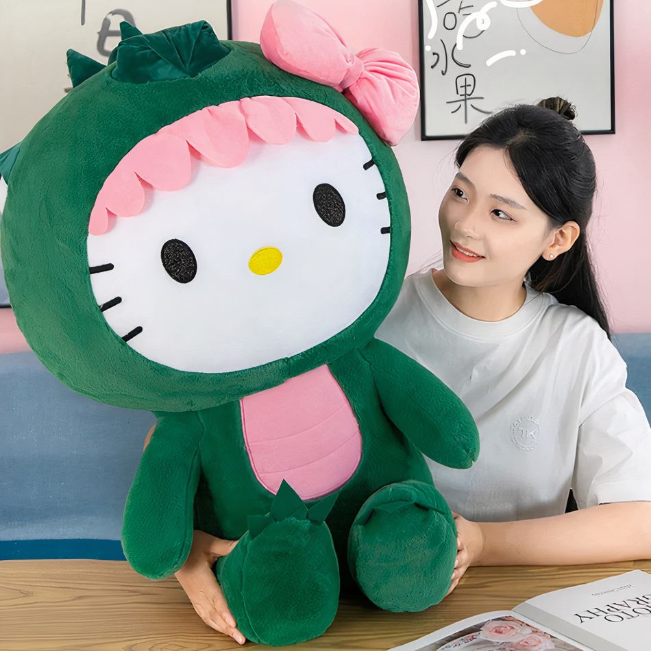 Peluche Hello Kitty dinosaure douce enfant câlin 65cm La compagnie de la peluche