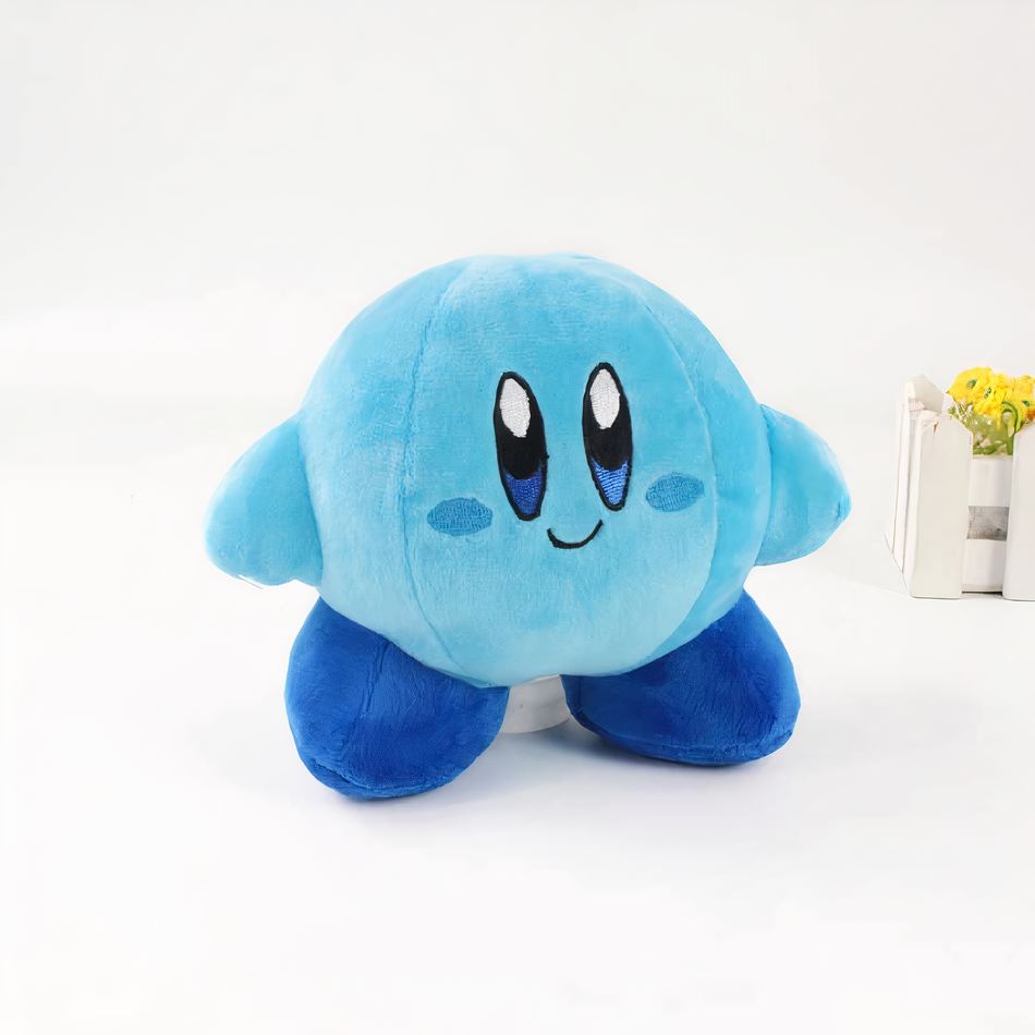 Peluche Kirby sourire joyeux rose bleu doux enfant bleu La compagnie de la peluche