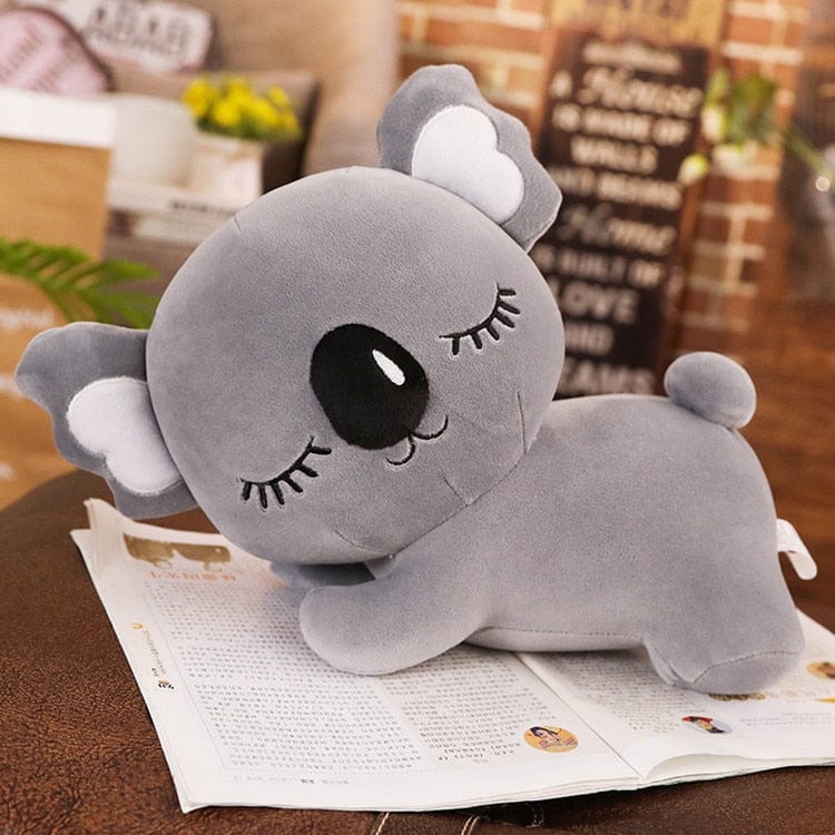 Peluche koala endormi avec de longs cils 35cm / Gris