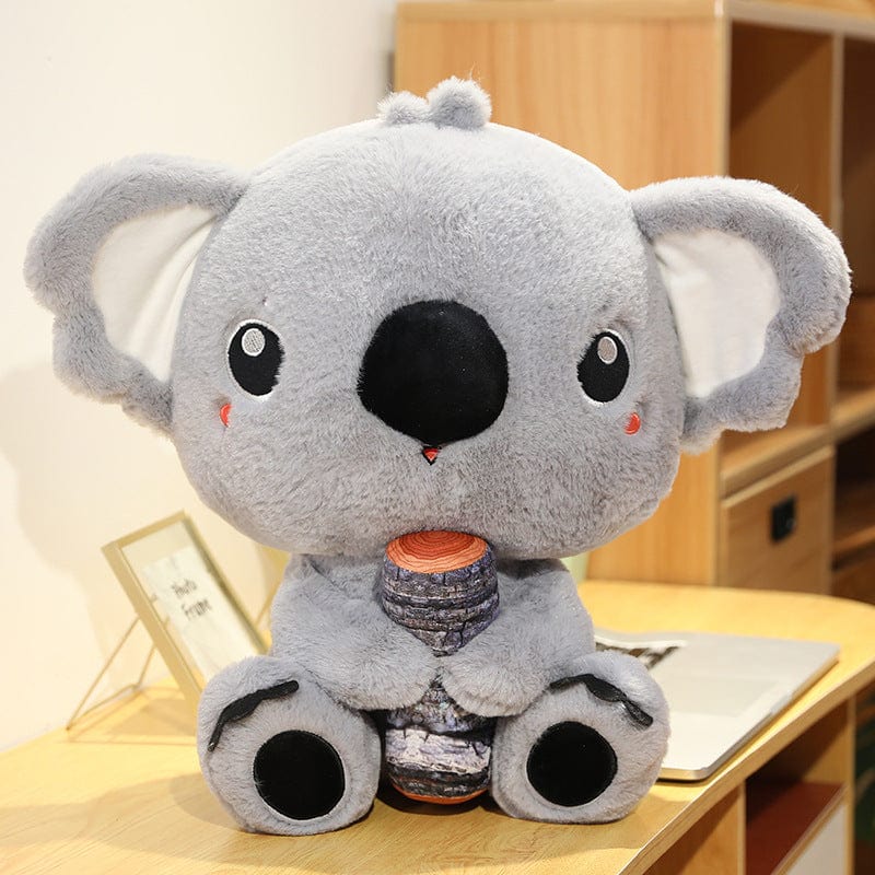 Peluche koala gris avec un gros nez