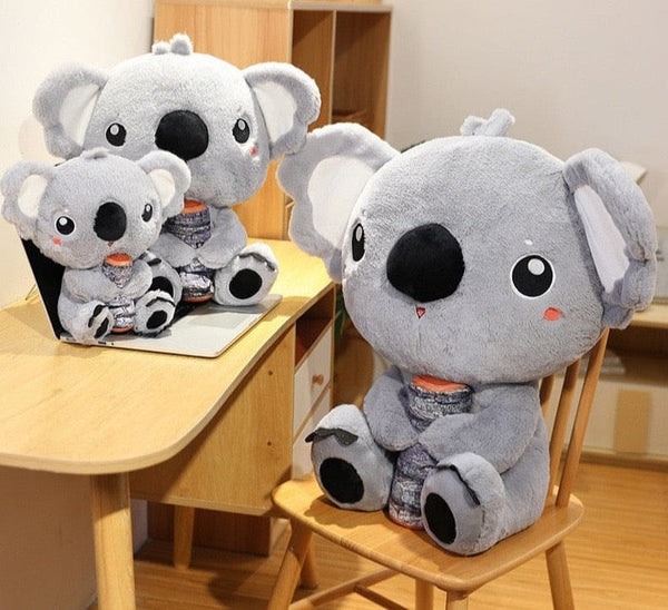 Peluche koala gris avec un gros nez