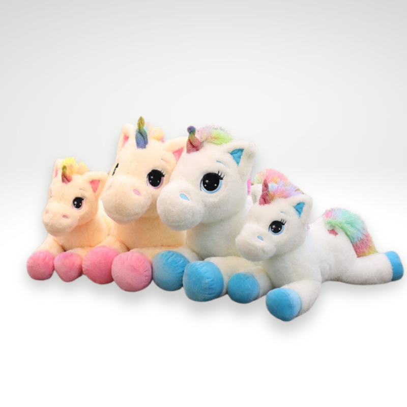 Peluche licorne avec des étoiles dans les yeux