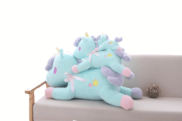 Peluche licorne bonbon bleu et rose