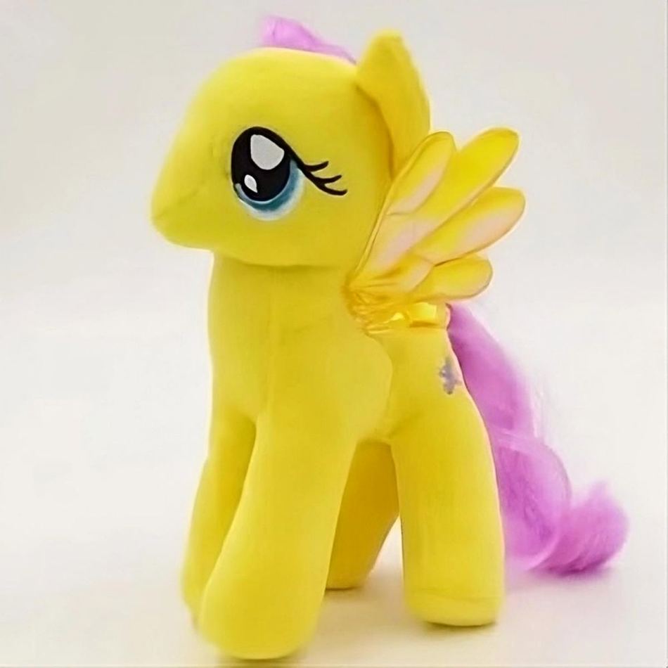 Peluche licorne jaune douce enfant arc-en-ciel rêveur La compagnie de la peluche