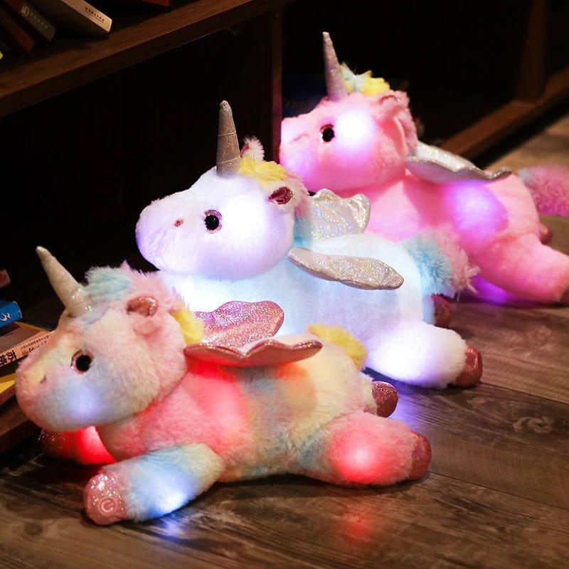 Peluche licorne multicolore eclaire