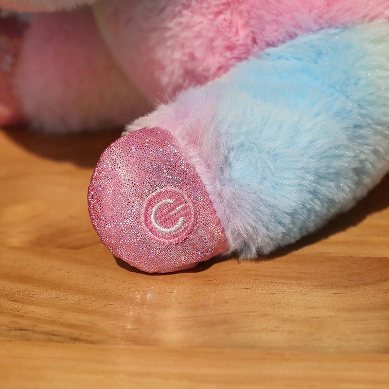 Peluche licorne multicolore éclairé