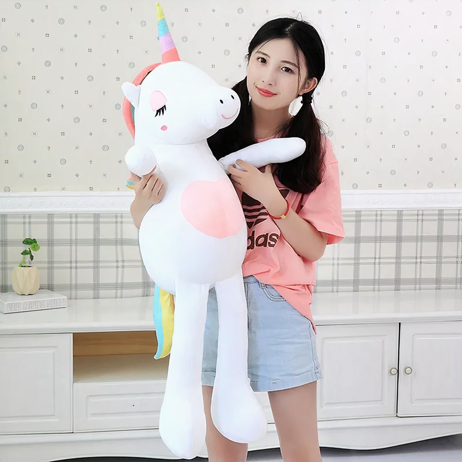 Peluche licorne XXL arc-en-ciel douce câline enfant 140cm / blanc La compagnie de la peluche
