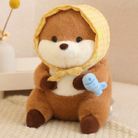 Peluche loutre avec un voile qui tient un poisson coloré Bleu