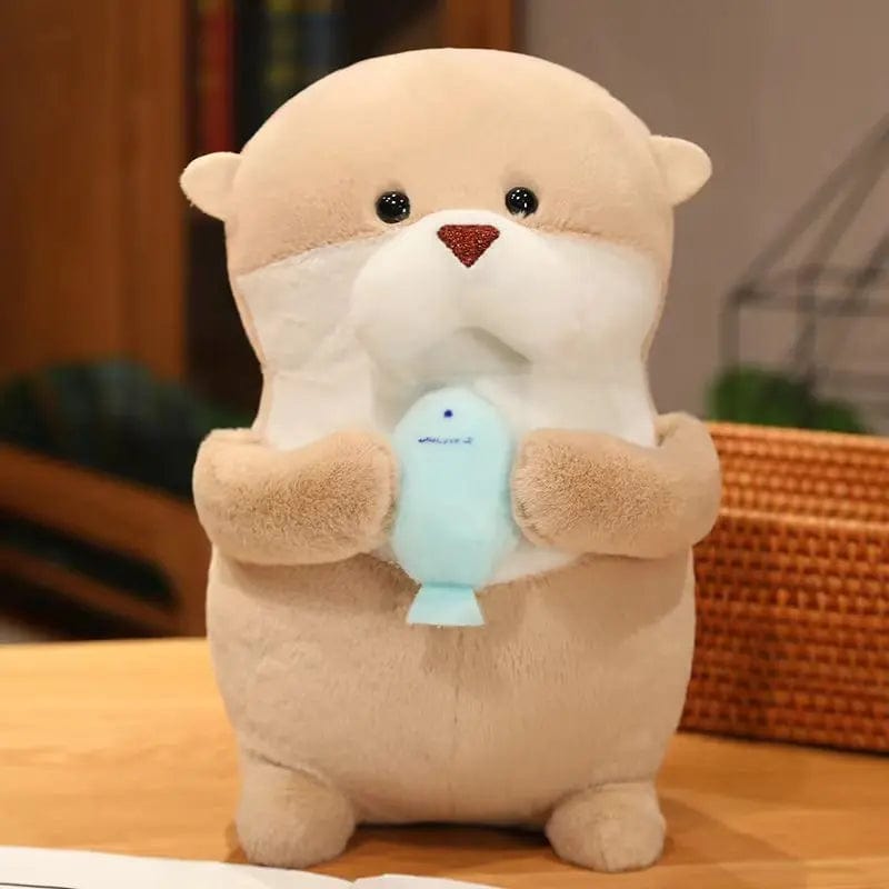 Peluche loutre tenant un poisson 10cm