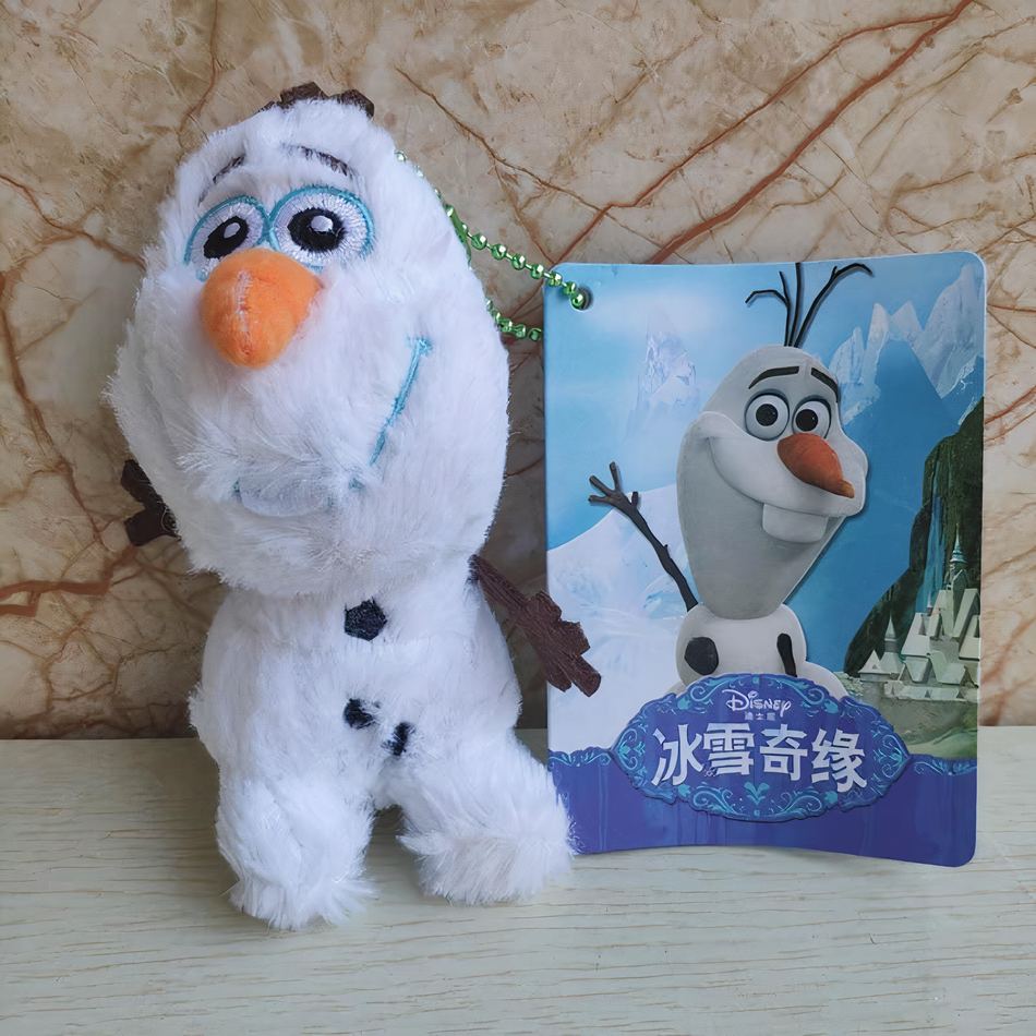 Peluche Olaf Disney pendentif doux hiver câlin La compagnie de la peluche