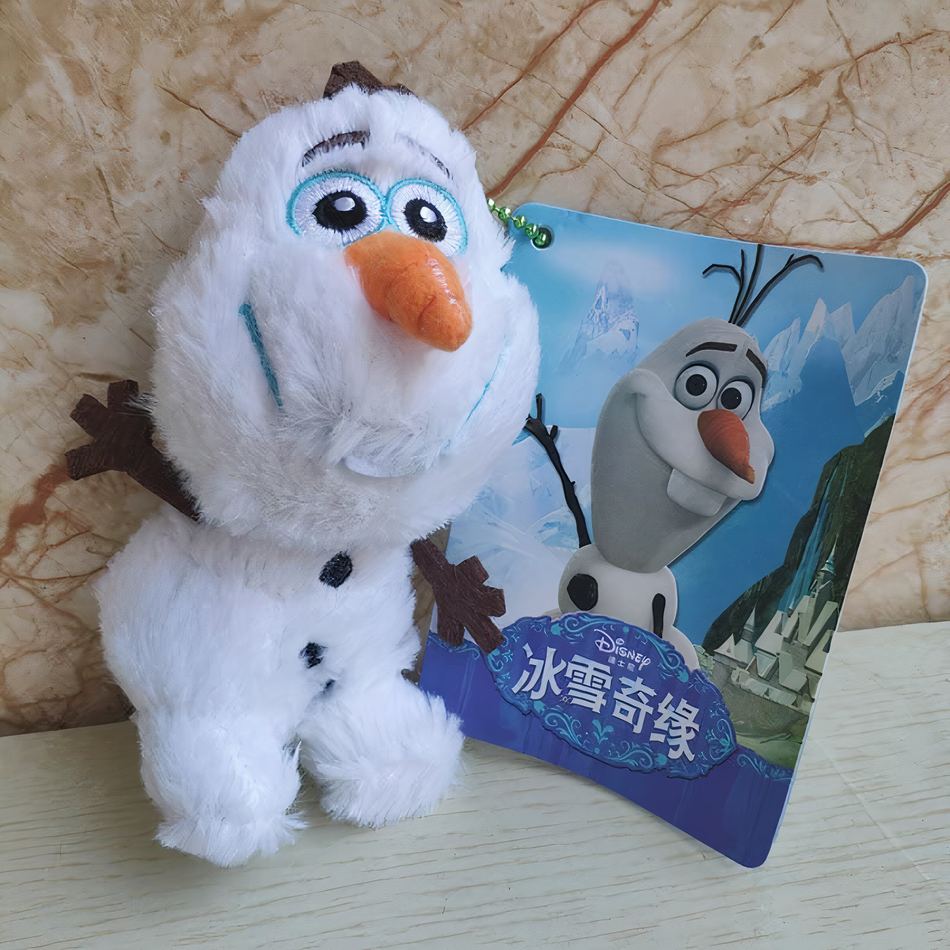 Peluche Olaf Disney pendentif doux hiver câlin La compagnie de la peluche