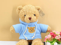 Peluche ourson doux pull bleu câlin hiver enfant La compagnie de la peluche
