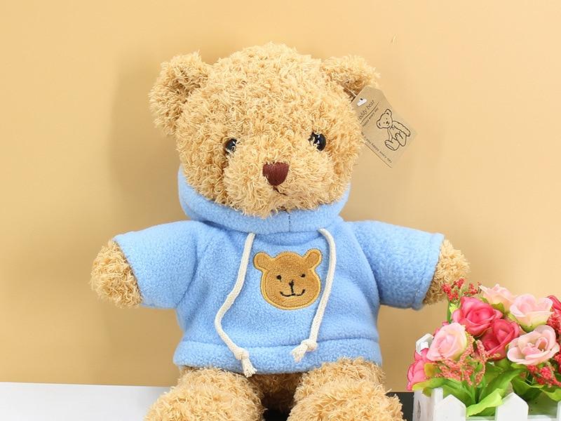 Peluche ourson doux pull bleu câlin hiver enfant La compagnie de la peluche
