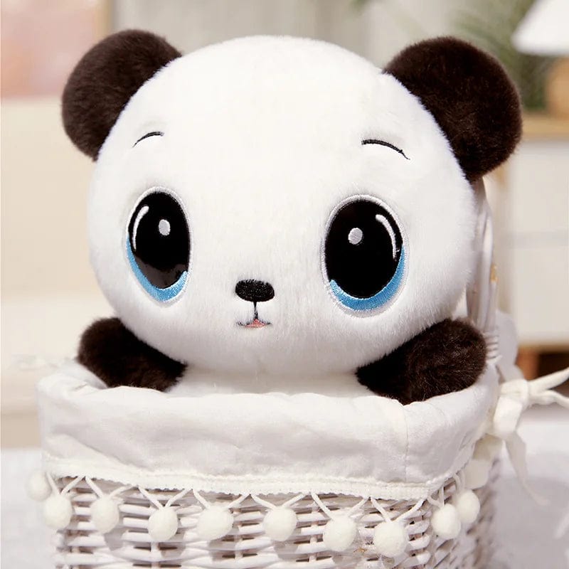 Peluche panda aux grands yeux bleus