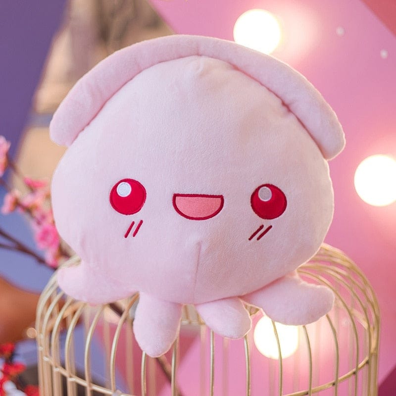 Peluche pieuvre rose expressive