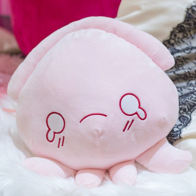 Peluche pieuvre rose expressive