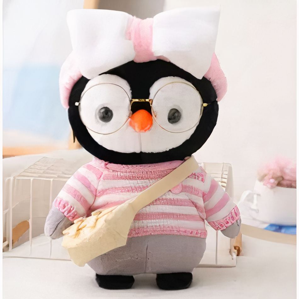 Peluche pingouin hiver doux avec pull rose tricoté La compagnie de la peluche