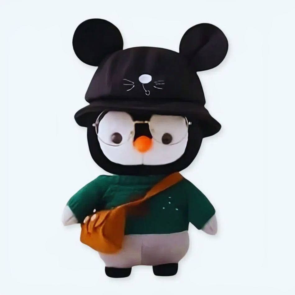 Peluche pingouin hiver pull vert doux câlin enfant La compagnie de la peluche
