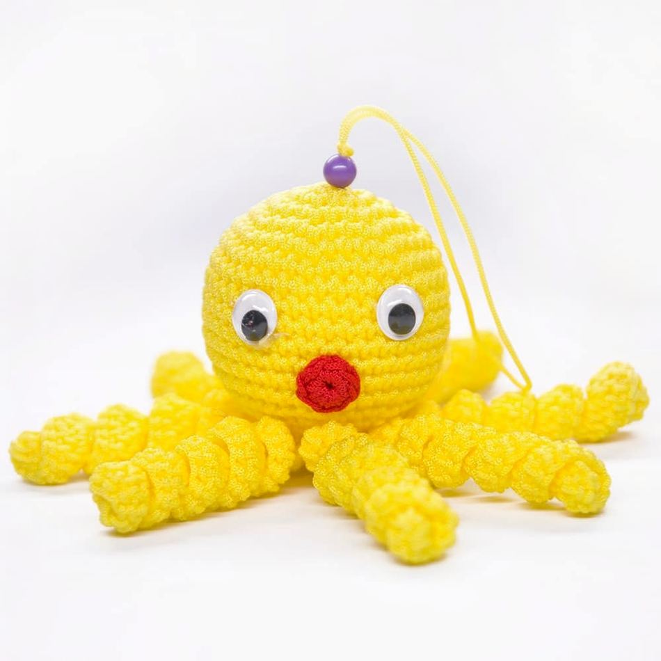 Peluche poulpe jaune enfant douce câlin océan tressée La compagnie de la peluche
