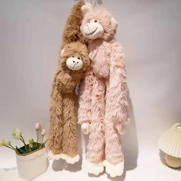 Peluche singe à câlins