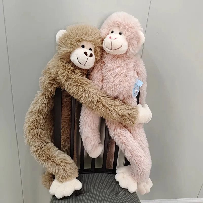 Peluche singe à câlins