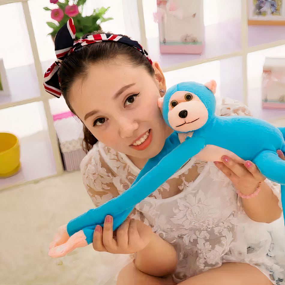 Peluche singe kawaii douce longue queue bleue câline La compagnie de la peluche