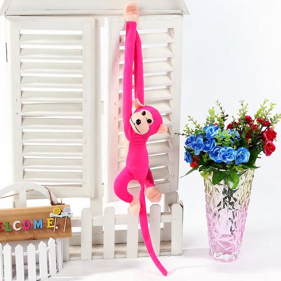 Peluche singe kawaii fushia longue queue douillet enfant La compagnie de la peluche