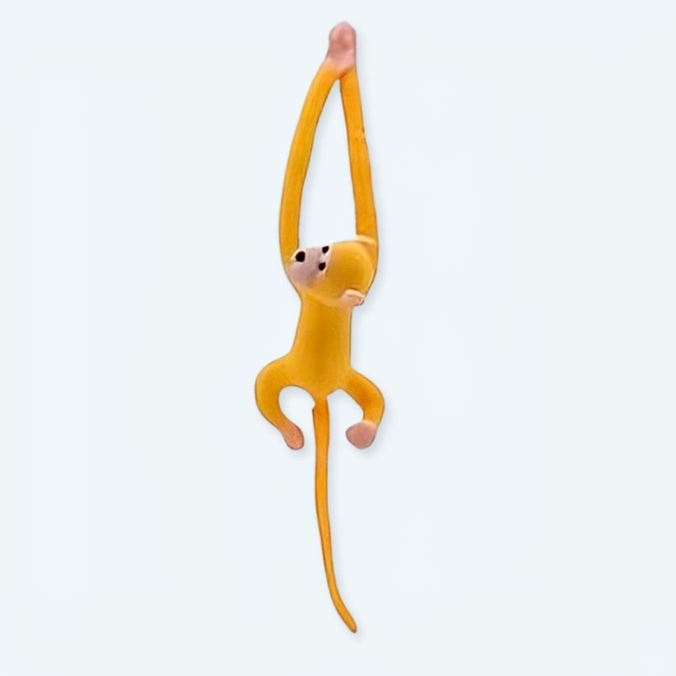 Peluche singe kawaii jaune moelleux longue queue enfant La compagnie de la peluche