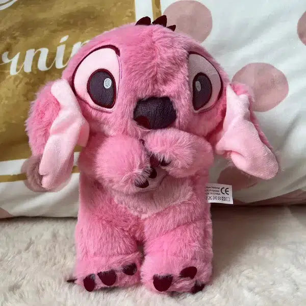 Peluche Stitch apaisante avec berceuse douce et respirante angel La compagnie de la peluche