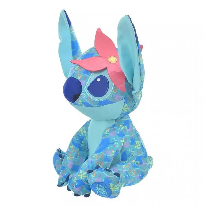 Peluche Stitch bleu clair avec une fleur rose