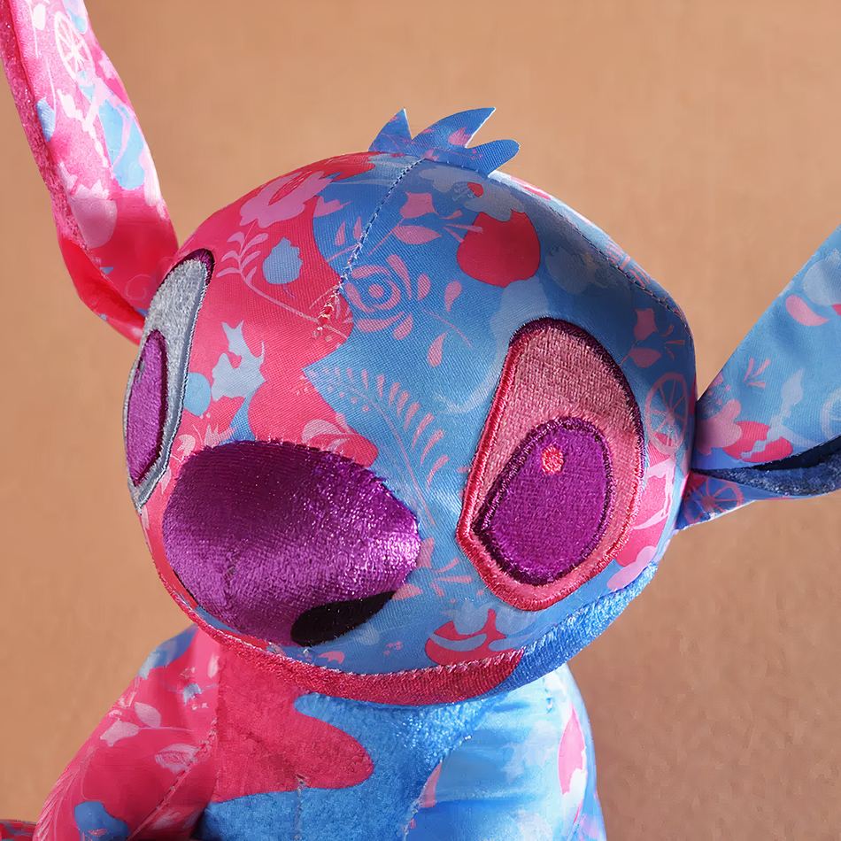 Peluche Stitch Disney rose bleu clair enfant câlin doux La compagnie de la peluche