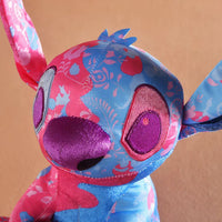 Peluche Stitch Disney rose bleu clair enfant câlin doux La compagnie de la peluche