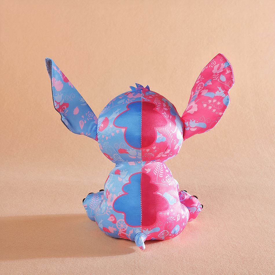 Peluche Stitch Disney rose bleu clair enfant câlin doux La compagnie de la peluche
