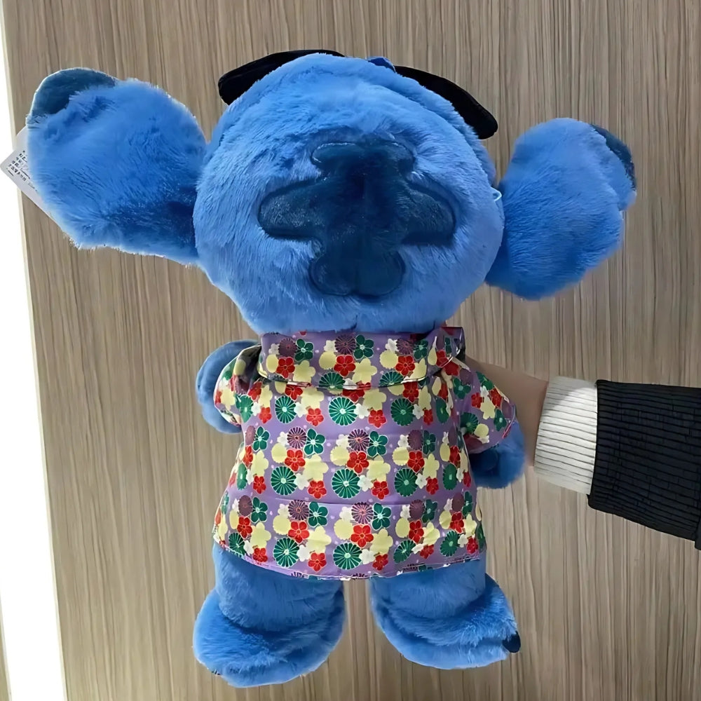 Peluche Stitch fleurs tropicales douce câline enfant La compagnie de la peluche