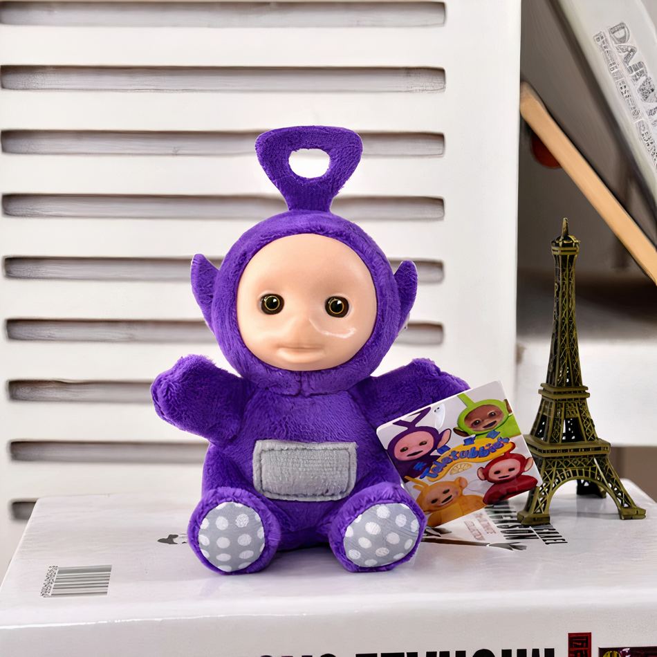Peluche Teletubbies pendentif doux enfant univers câlin violet La compagnie de la peluche