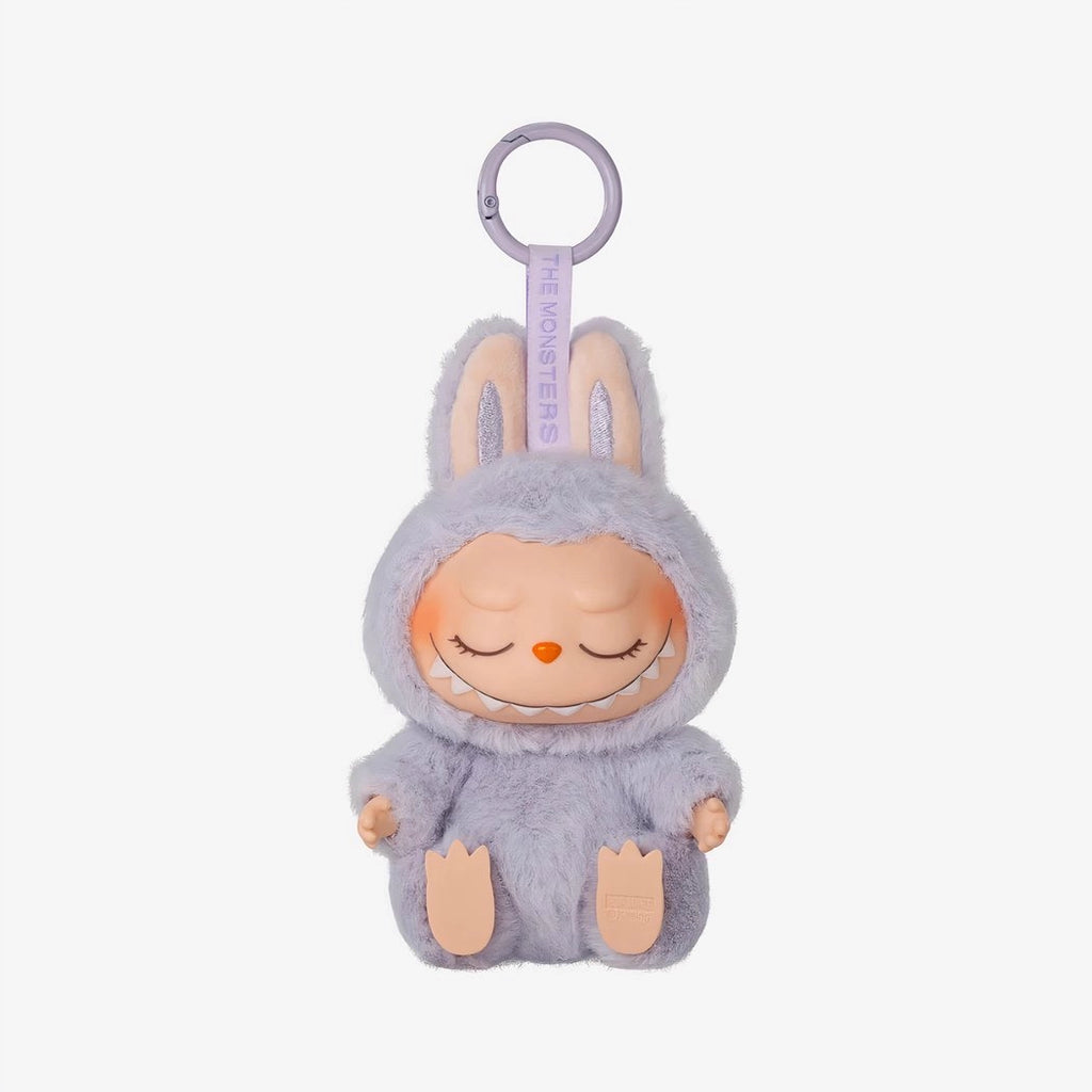 Peluche type Labubu assise boîte mystère
