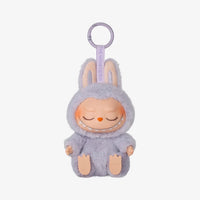 Peluche type Labubu assise boîte mystère