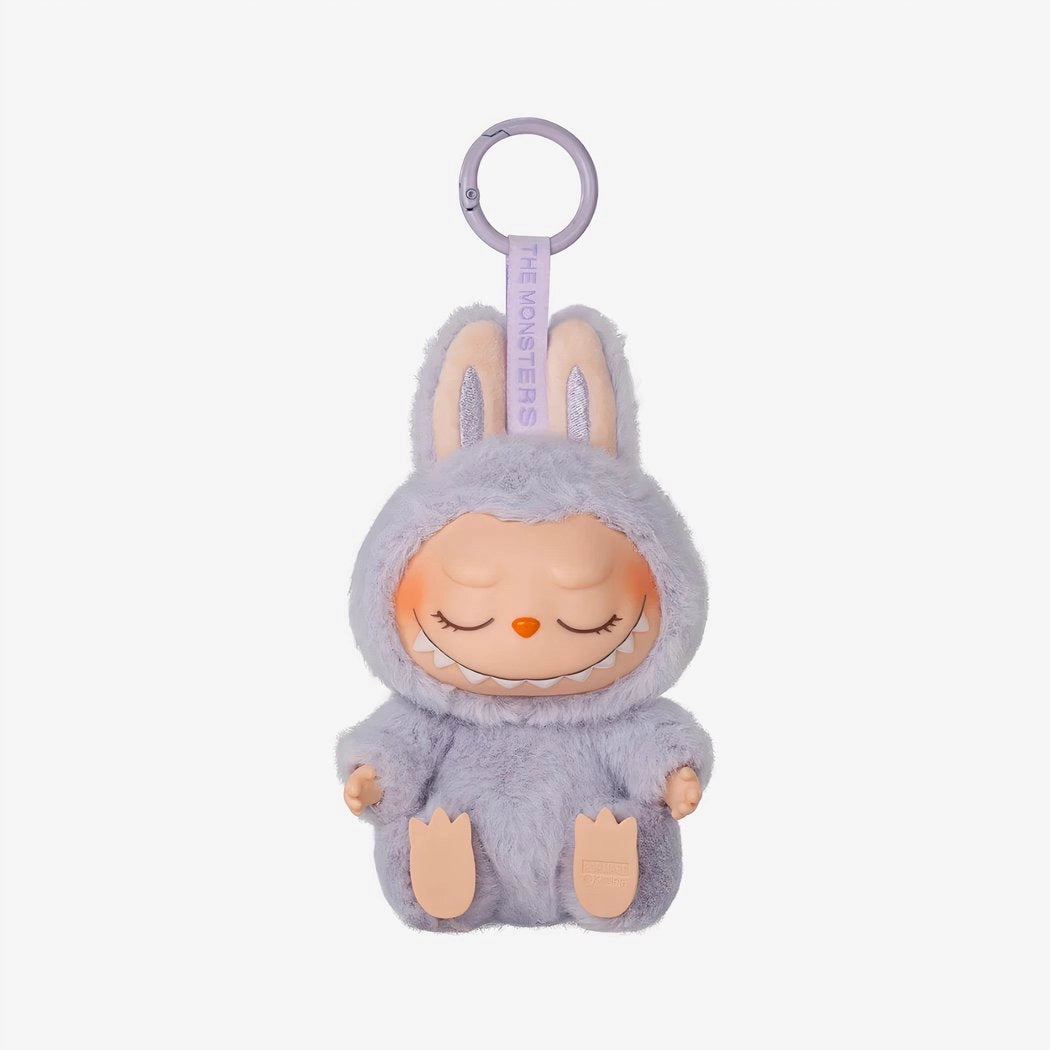Peluche type Labubu assise boîte mystère