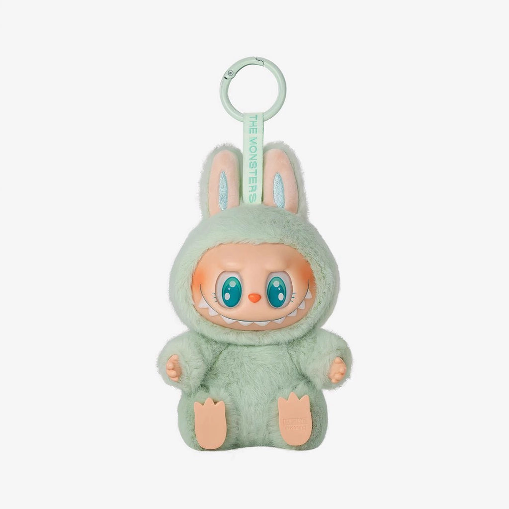 Peluche type Labubu assise boîte mystère