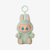 Peluche type Labubu assise boîte mystère