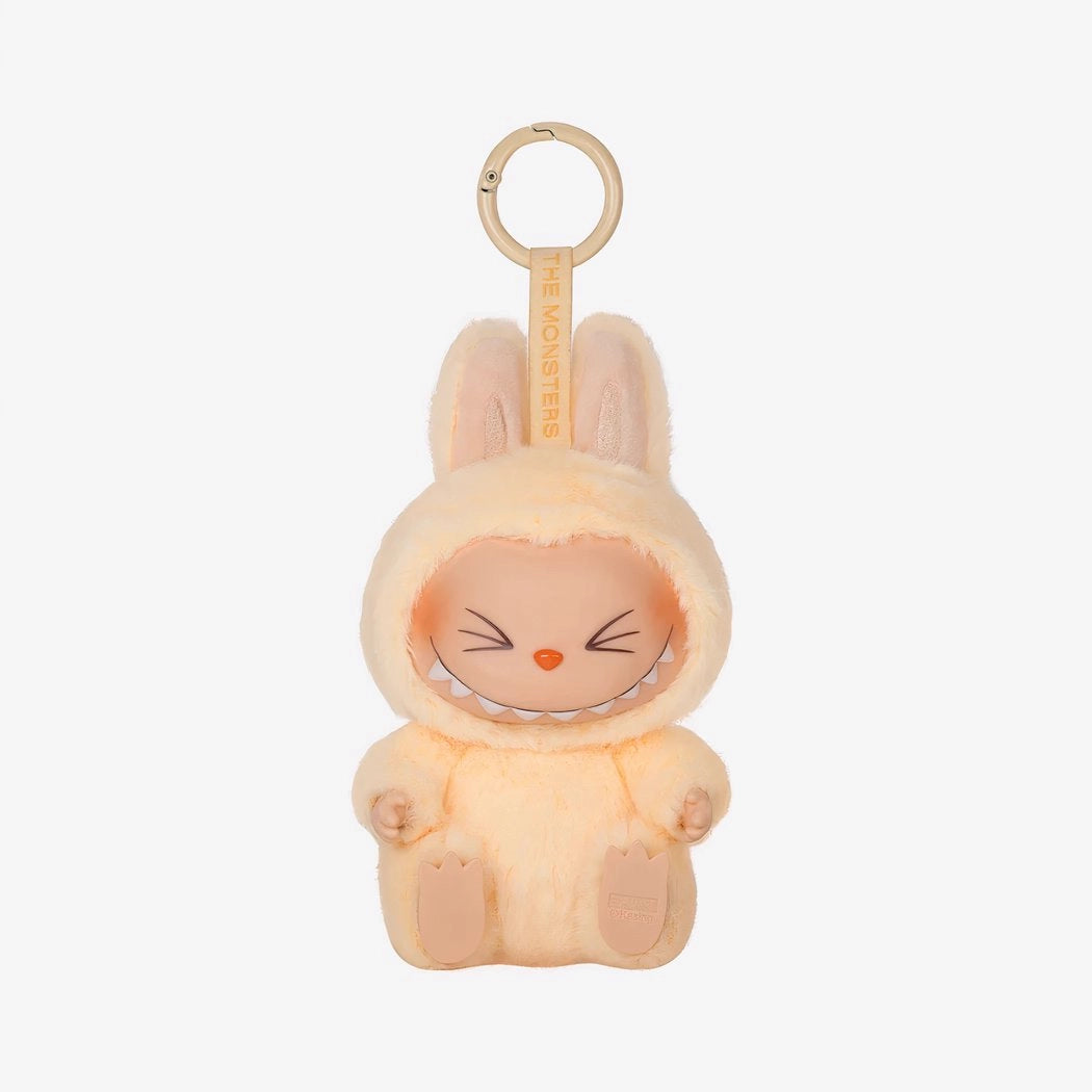 Peluche type Labubu assise boîte mystère