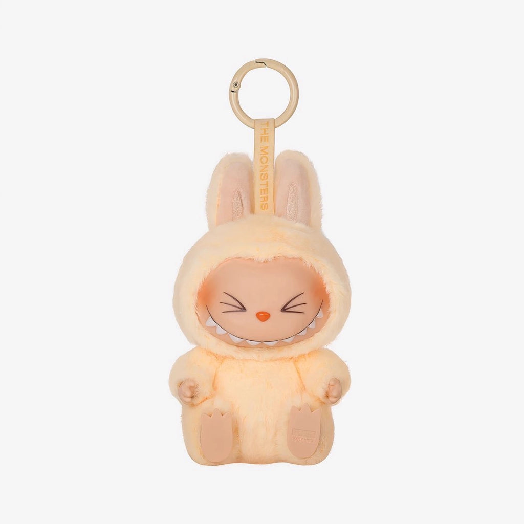 Peluche type Labubu assise boîte mystère